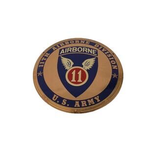 Vintage 11th Airborne Division U S Army brass plaque or license plate topper